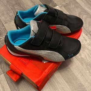 NWT. Girls Puma shoes. Black, aqua, and glitter. Size 13.